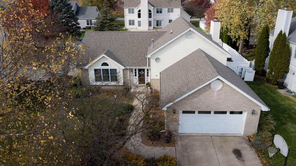 A well-maintained home with a new roof, highlighting expert roofing services that enhance curb appeal and structural integrity.